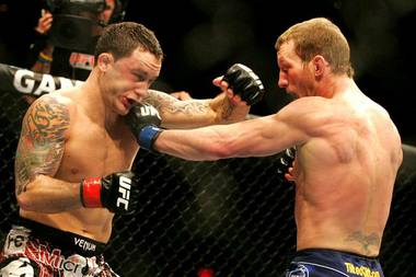 Gray Maynard tags Frankie Edgar with a left during their lightweight title fight at UFC 125 on Saturday, Jan. 1, 2011, at MGM Grand Garden Arena. Maynard and Edgar fought to a draw.