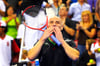 Andre Agassi blows a kiss to the crowd after beating Pete Sampras during the Las Vegas stop of the 2011 Champions Series Tennis tournament Saturday, Oct. 15, 2011.