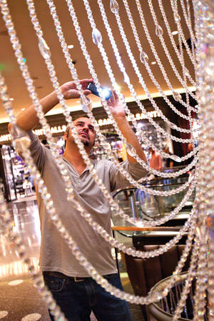Snapping photos of the Chandelier Bar's canopy of 2 million crystal beads.