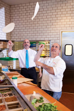 Sam Facchini, left, and John Arena want to teach pizza to the masses at Metro.