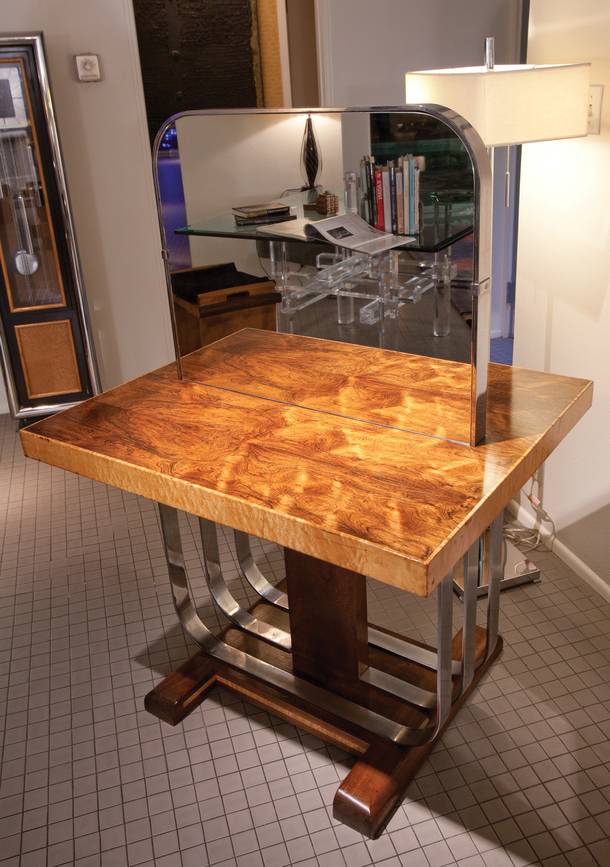 An art deco table once used in a milliner store is in the home of Steve Evans