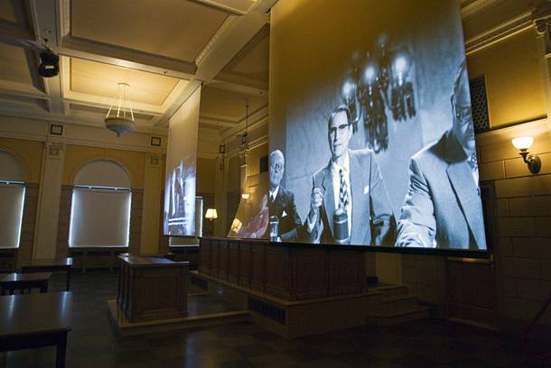 A video presentation is shown in a courtroom during a media preview tour of the Mob Museum in downtown Las Vegas Monday, Feb. 13, 2012. The courtroom is the Las Vegas site of a Kefauver hearing, part of a series of U.S. Senate Special Committee hearings on organized crime in 1950-51. The actor at center portrays U.S. Sen. Estes Kefauver. The museum, in a renovated former federal courthouse and U.S. Post Office, will have its grand opening Tuesday.