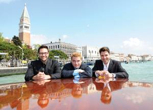 Strip headliner Frankie Moreno, right, with his brothers Tony, left and Ricky take a water cab through Grand Canal in Venice.