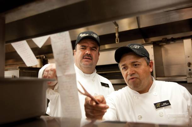 Jose de la Torre, left, and Aaron Lanoz demand the best from one another at Bellagio's breakfast station.