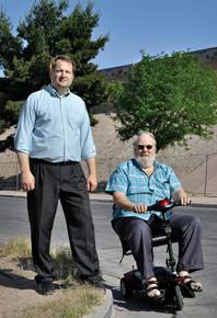 WALKING A MILE: When Dupalo (left) was temporarily disabled, he gained insight into the plight of people like George Flatman, who contend with streets that lack sidewalks and curbs.