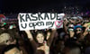 A fan holds up a sign for DJ Kaskade at Electric Daisy Carnival Night 1 at the Las Vegas Motor Speedway on June 8, 2012. 
