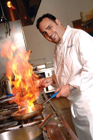 Chef Barry Dakake mans the kitchen at N9NE Steakhouse.