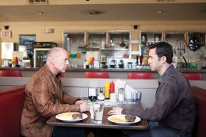 Bruce Willis and Joseph Gordon-Levitt are far more interested in talking than in their steak and eggs in the very clever </em>Looper</em>.