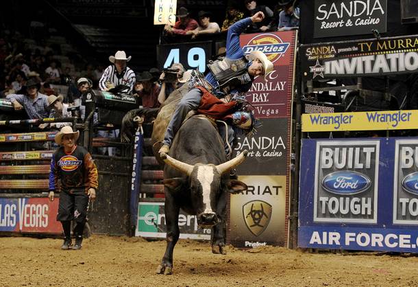 Renato Nunes tries to make the whistle on PBR legend Chicken on a Chain.