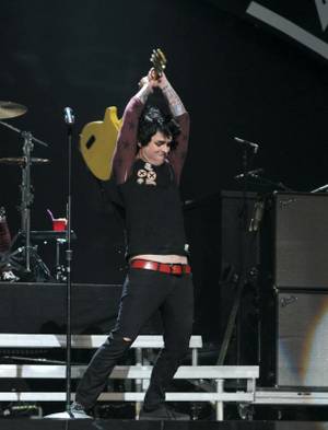 Green Day's Billie Joe Armstrong smashes his guitar at the iHeartRadio Music Festival on September 21 at the MGM Grand Garden Arena.