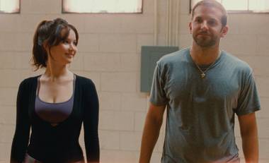 Bradley Cooper and Jennifer Lawrence are crazy … in love in Silver Linings Playbook.