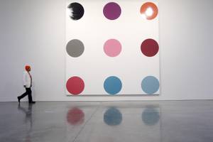 Damien Hirst at <em>The Complete Spot Paintings 1986-2011</em> at Gagosian Gallery in New York.