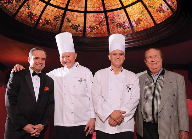 Credit for the classic experience at Michael's goes to (from left) maitre d' Jose Martel, executive chef Fred Bielek, assistant chef Mario Fernandez and manager Steve Delmont.