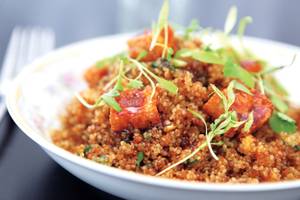 Poppy Den’s quinoa fried rice is topped with sun-dried pineapple.