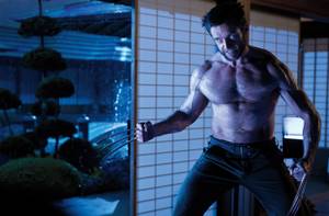 Hugh Jackman gets out his claws in <em>The Wolverine</em>.