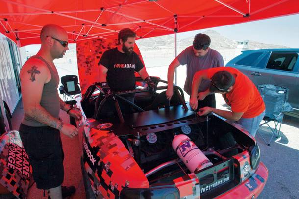 George, Danny, Kyle and Julian get the Miata ready for runs at Willow Springs. Little did they know they would have issues with the cooling system, exhaust and transmission that day. As Kyle says, it's better to have sh*t break during practice.