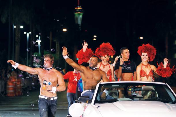Many local organizations join in on the Pride parade fun, including the casts of Chippendales and Divas.