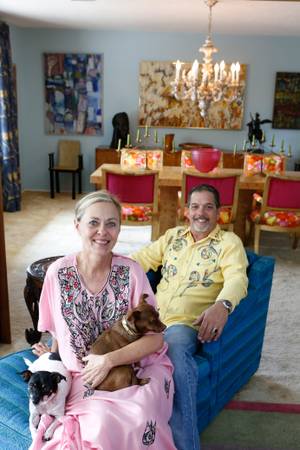 Kate Aldrich and Tim Shaffer, owners of Patina Decor, pose with their dogs Frida and Petra in their Downtown Las Vegas home.  