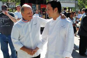 Chefs Joël Robuchon and Ho Chee Boon seemed to have no problem sampling eight mini-burgers.