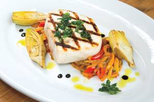 Buddy V's has some lighter dishes, including grilled swordfish peperonata.