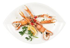 Milos' langoustines are sourced from Scotland and made with hand-shoveled salt from Kythira island in Greece as well as organic lemons and parsley from California.