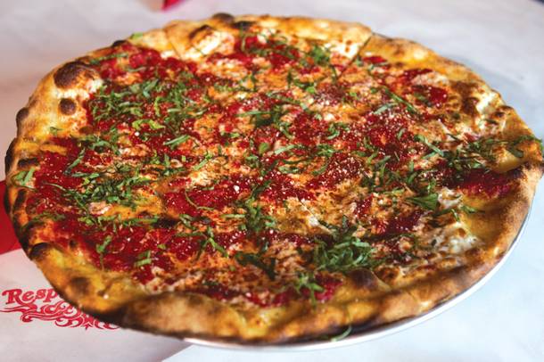 If you like Grimaldi's coal-fired oven pizza, you need to try Pizza Rock's tomato pie.