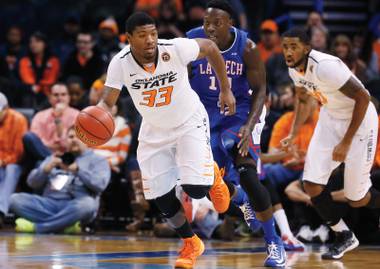 See Oklahoma State star guard Marcus Smart in the MGM Grand Showcase December 21. 