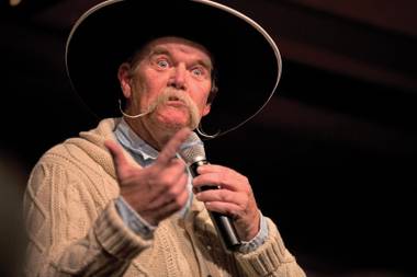 Cowboy poet: Waddie Mitchell and his mustache recite a poem during the 30th National Cowboy Poetry Gathering in Elko.