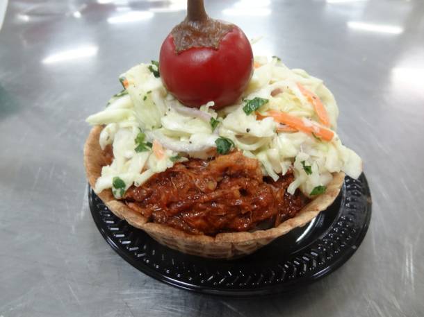Las Vegas Motor Speedway's new barbecue offerings include the Bucket o’ BBQ, with pulled pork, cherry peppers, potato salad, coleslaw and Levy Restaurants barbecue sauce served inside a tasty waffle bowl.
