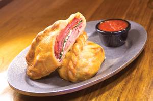 The calzone-ish Italian is stuffed with pepperoni, salami, ham and more.