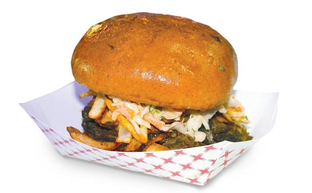 Must-eat meat: Truck U Barbeque's torta, smoky goodness topped with coleslaw and duck fat fries on a brioche roll.