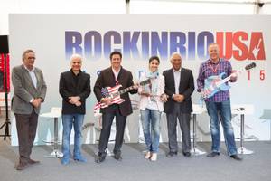 The passing of the torch—er, guitar: Friday evening Lisbon Mayor Antonio Costa passed along a ceremonial key (and two guitars) to MGM Resorts International and Cirque du Soleil, who will present Rock in Rio USA on the Strip in May 2015.