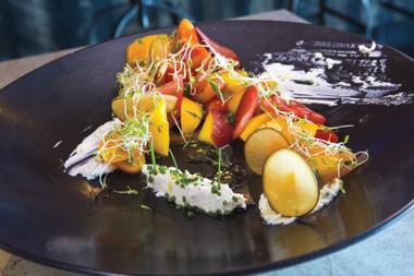 Chef Johnny Church pairs stone fruit with heirloom tomatoes, plus creamy compressed yogurt.