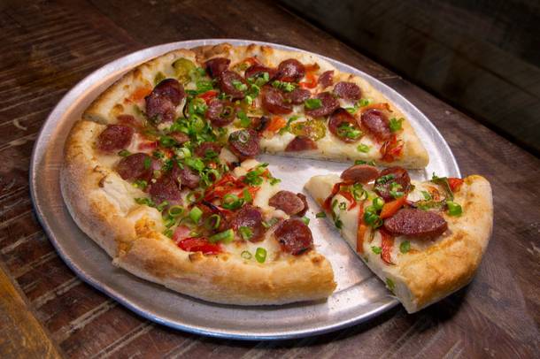 Looking for Asian flavors on a pizza? F.A.M.E.'s got it, thanks to Pizza Buddha.