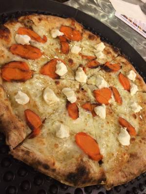A surprise seventh pizza from Metro's kitchen—roasted carrots, maple and goat cheese.