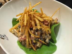 Border Grill's new black bean and corn esquite salad, with chipotle aioli, baby bibb lettuce and avocado.