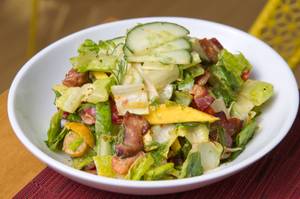 Pay attention to the sriracha-spiked dill dressing on the Perch's chopped salad.