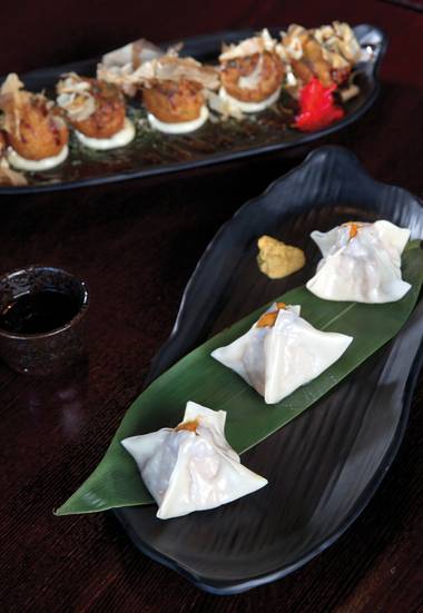 Uni shumai and takoyaki are must-eat dishes at Go.