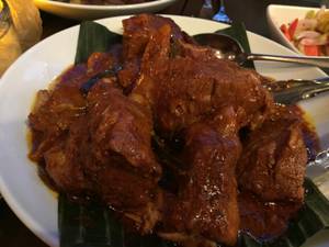 Mike Minor's <em>cochinita pibil</em>, slow-roasted achiote pork.