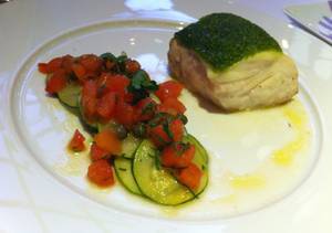Fresh herb-crusted halibut with zucchini and summer squash and sauce vierge.