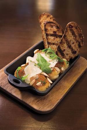 Therapy's In the Gnudi, a baked ricotta pasta dessert masquerading as a starter.