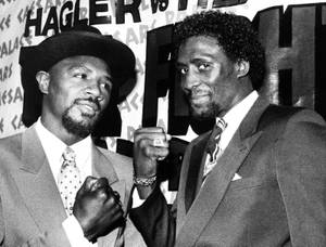 Marvin Hagler (and Tommy Hearns get fired up during a January 1985 news conference hyping their April 15 middleweight title bout at Caesars. 