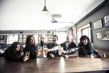 Ian, fourth from left, and Anthrax play Friday at 10:10 p.m. (Courtesy)