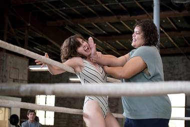 Alison Brie gets slapped around by Britney Young.