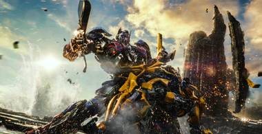 Optimus Prime and Bumblebee do battle.