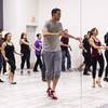 Co-owners Nate Strager, center, and Virginia Cano, second from right, lead students during a Sin City Salseros beginning salsa class at Rhythms Dance Studio and Event Center.