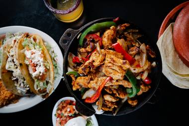 Chicken fajitas, a rancho style taco and a shredded beef taco at Juan’s.