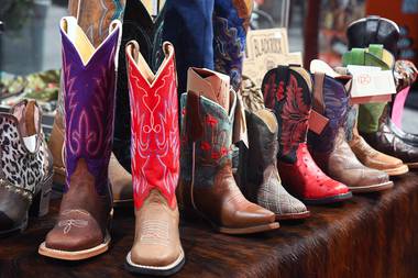 This year’s event is slated to host some 300 exhibitors, from major brands (Wrangler, Roper, Boot Barn) to indie crafters and small businesses (Monique’s Leather, Art by Amy Labbe, Rodeo Time Fudge).