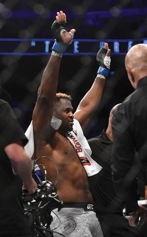 Francis Ngannou celebrates after knocking out Alistair Overeem at UFC 218 in December 2017.