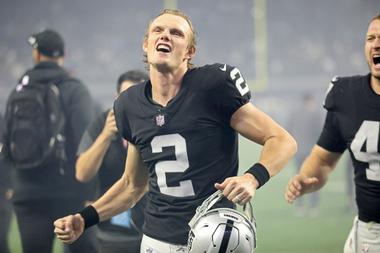 Las Vegas’ Daniel Carlson reacts after kicking the game-winning field goal against Los Angeles in overtime January 9